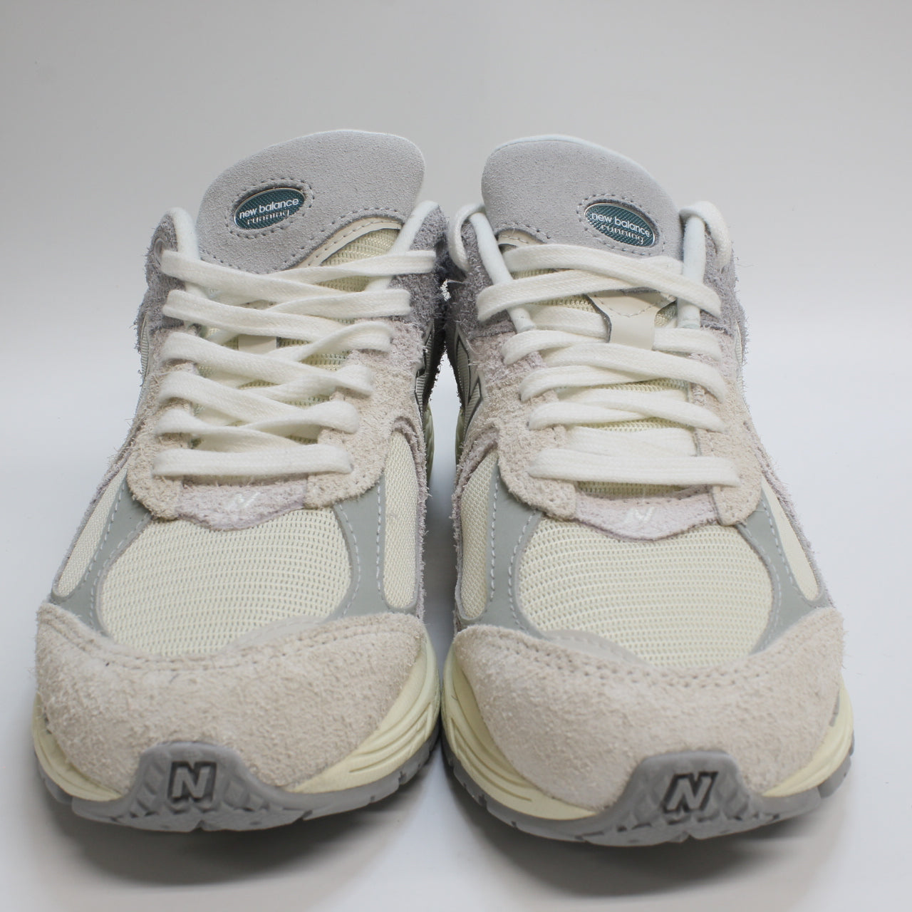 New Balance 2002 Offwhite Cream Grey Trainers